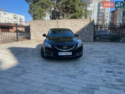 Черный Мазда 6, объемом двигателя 1.8 л и пробегом 245 тыс. км за 7500 $, фото 1 на Automoto.ua