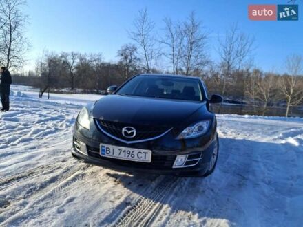 Черный Мазда 6, объемом двигателя 1.8 л и пробегом 137 тыс. км за 5600 $, фото 1 на Automoto.ua