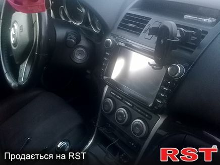 Черный Мазда 6, объемом двигателя 1.8 л и пробегом 226 тыс. км за 6000 $, фото 1 на Automoto.ua