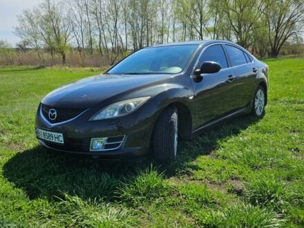 Черный Мазда 6, объемом двигателя 2 л и пробегом 145 тыс. км за 8200 $, фото 1 на Automoto.ua