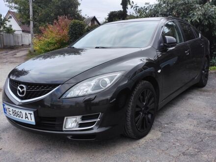 Черный Мазда 6, объемом двигателя 2 л и пробегом 230 тыс. км за 7335 $, фото 1 на Automoto.ua