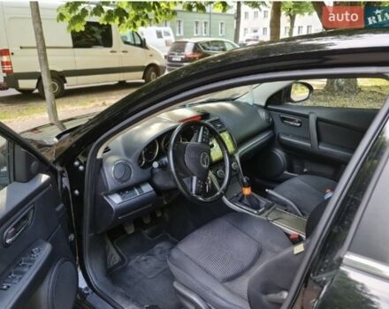 Черный Мазда 6, объемом двигателя 2.2 л и пробегом 360 тыс. км за 8000 $, фото 1 на Automoto.ua