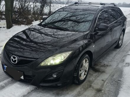 Черный Мазда 6, объемом двигателя 2.2 л и пробегом 250 тыс. км за 6500 $, фото 1 на Automoto.ua