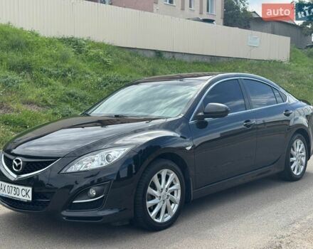 Черный Мазда 6, объемом двигателя 1.8 л и пробегом 134 тыс. км за 6900 $, фото 1 на Automoto.ua