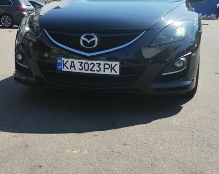 Черный Мазда 6, объемом двигателя 2.2 л и пробегом 300 тыс. км за 7500 $, фото 1 на Automoto.ua