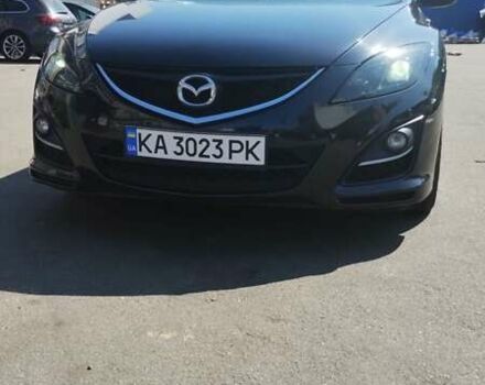 Черный Мазда 6, объемом двигателя 2.2 л и пробегом 308 тыс. км за 7500 $, фото 1 на Automoto.ua
