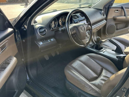 Черный Мазда 6, объемом двигателя 2.2 л и пробегом 258 тыс. км за 7500 $, фото 1 на Automoto.ua