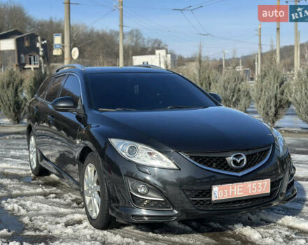 Черный Мазда 6, объемом двигателя 2 л и пробегом 250 тыс. км за 8900 $, фото 1 на Automoto.ua