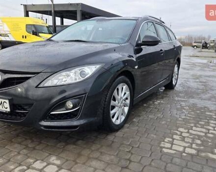 Черный Мазда 6, объемом двигателя 2.18 л и пробегом 307 тыс. км за 5900 $, фото 1 на Automoto.ua