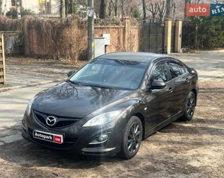Черный Мазда 6, объемом двигателя 2 л и пробегом 253 тыс. км за 9990 $, фото 1 на Automoto.ua