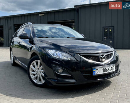 Черный Мазда 6, объемом двигателя 2.18 л и пробегом 258 тыс. км за 7700 $, фото 1 на Automoto.ua