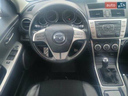 Черный Мазда 6, объемом двигателя 2 л и пробегом 173 тыс. км за 8500 $, фото 1 на Automoto.ua