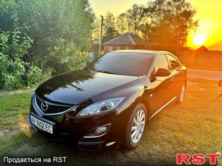 Черный Мазда 6, объемом двигателя 2 л и пробегом 191 тыс. км за 7700 $, фото 1 на Automoto.ua