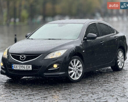 Черный Мазда 6, объемом двигателя 2 л и пробегом 169 тыс. км за 7990 $, фото 1 на Automoto.ua