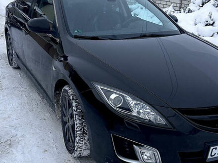 Черный Мазда 6, объемом двигателя 2 л и пробегом 173 тыс. км за 7000 $, фото 1 на Automoto.ua