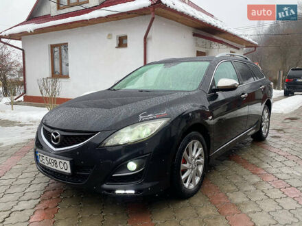 Черный Мазда 6, объемом двигателя 2.2 л и пробегом 325 тыс. км за 5650 $, фото 1 на Automoto.ua