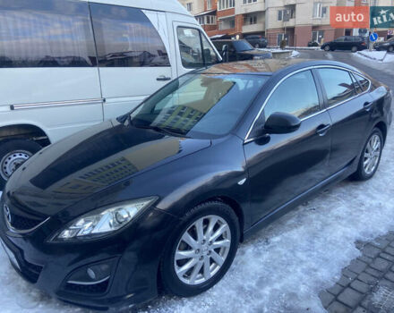 Черный Мазда 6, объемом двигателя 2.2 л и пробегом 340 тыс. км за 6700 $, фото 1 на Automoto.ua