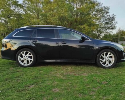 Чорний Мазда 6, об'ємом двигуна 2 л та пробігом 260 тис. км за 9638 $, фото 1 на Automoto.ua