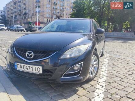 Черный Мазда 6, объемом двигателя 1.8 л и пробегом 238 тыс. км за 6400 $, фото 1 на Automoto.ua