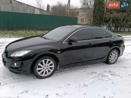 Черный Мазда 6, объемом двигателя 2 л и пробегом 180 тыс. км за 7700 $, фото 1 на Automoto.ua
