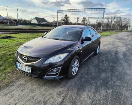 Черный Мазда 6, объемом двигателя 1.8 л и пробегом 245 тыс. км за 5900 $, фото 1 на Automoto.ua