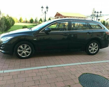 Черный Мазда 6, объемом двигателя 2.2 л и пробегом 180 тыс. км за 8500 $, фото 1 на Automoto.ua