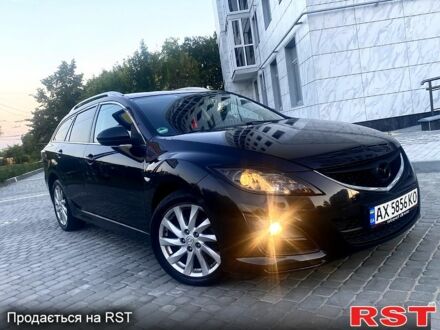 Черный Мазда 6, объемом двигателя 2.2 л и пробегом 273 тыс. км за 7600 $, фото 1 на Automoto.ua