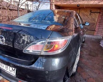 Черный Мазда 6, объемом двигателя 1.8 л и пробегом 146 тыс. км за 8700 $, фото 1 на Automoto.ua