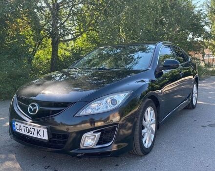 Черный Мазда 6, объемом двигателя 2.18 л и пробегом 270 тыс. км за 6800 $, фото 1 на Automoto.ua