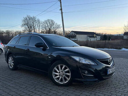 Черный Мазда 6, объемом двигателя 2.18 л и пробегом 249 тыс. км за 6800 $, фото 1 на Automoto.ua