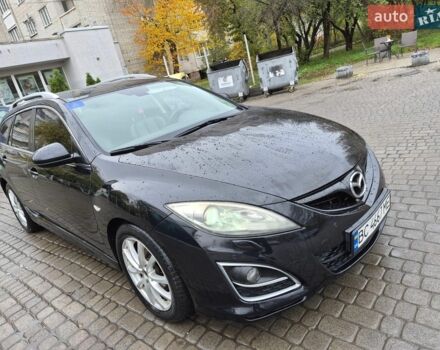 Черный Мазда 6, объемом двигателя 2.2 л и пробегом 302 тыс. км за 7200 $, фото 1 на Automoto.ua