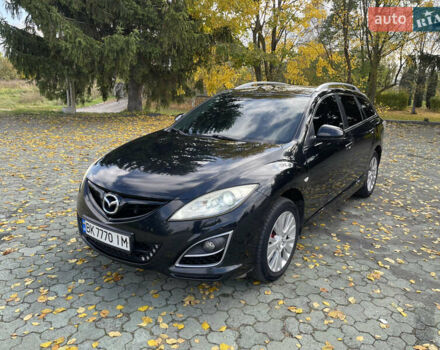 Черный Мазда 6, объемом двигателя 2.2 л и пробегом 267 тыс. км за 6300 $, фото 1 на Automoto.ua