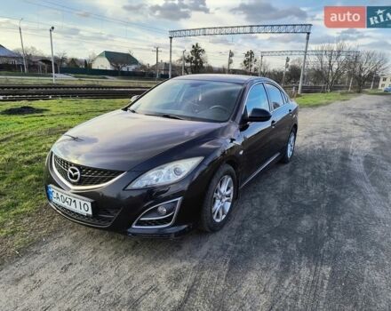Черный Мазда 6, объемом двигателя 1.8 л и пробегом 245 тыс. км за 5700 $, фото 1 на Automoto.ua