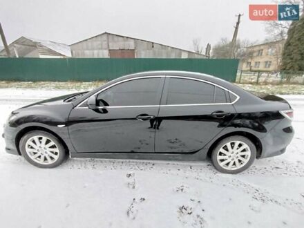 Черный Мазда 6, объемом двигателя 2 л и пробегом 180 тыс. км за 7800 $, фото 1 на Automoto.ua