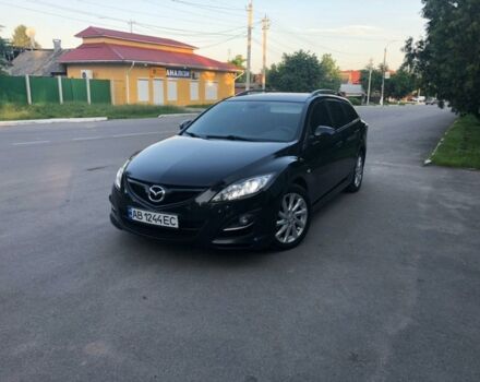 Черный Мазда 6, объемом двигателя 2.2 л и пробегом 257 тыс. км за 9000 $, фото 1 на Automoto.ua