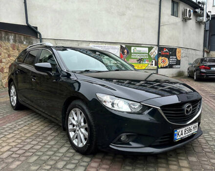 Черный Мазда 6, объемом двигателя 2.2 л и пробегом 266 тыс. км за 10600 $, фото 1 на Automoto.ua