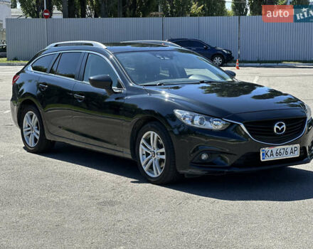 Черный Мазда 6, объемом двигателя 2.19 л и пробегом 220 тыс. км за 9900 $, фото 1 на Automoto.ua