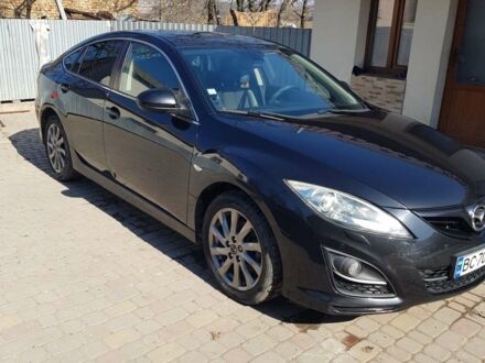 Черный Мазда 6, объемом двигателя 2.2 л и пробегом 205 тыс. км за 9100 $, фото 1 на Automoto.ua