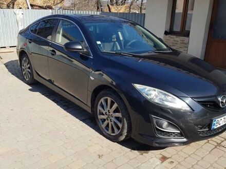 Черный Мазда 6, объемом двигателя 2.2 л и пробегом 205 тыс. км за 9100 $, фото 1 на Automoto.ua