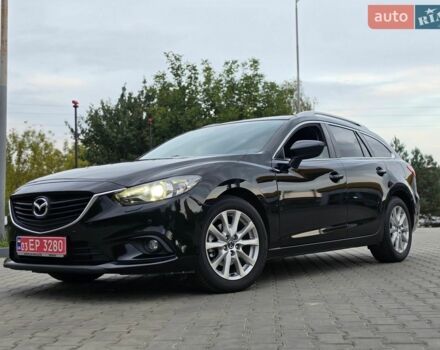 Черный Мазда 6, объемом двигателя 2.2 л и пробегом 257 тыс. км за 9850 $, фото 1 на Automoto.ua