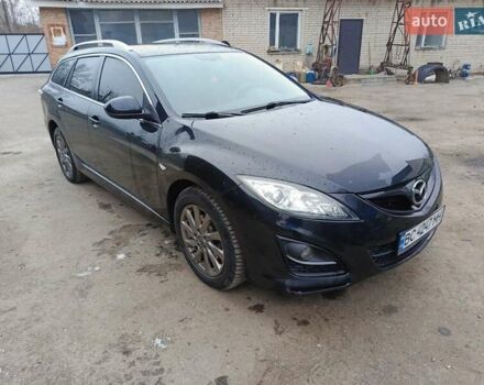 Черный Мазда 6, объемом двигателя 2.2 л и пробегом 270 тыс. км за 6999 $, фото 1 на Automoto.ua