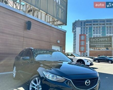 Черный Мазда 6, объемом двигателя 2.18 л и пробегом 269 тыс. км за 11700 $, фото 1 на Automoto.ua