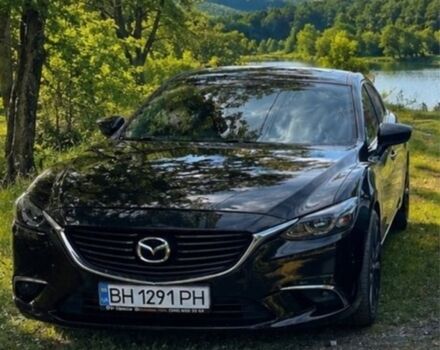 Черный Мазда 6, объемом двигателя 2.5 л и пробегом 210 тыс. км за 13832 $, фото 1 на Automoto.ua