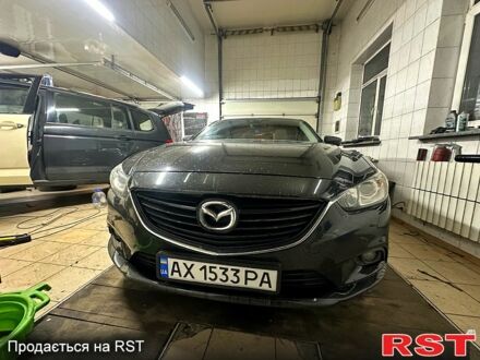 Черный Мазда 6, объемом двигателя 2.5 л и пробегом 256 тыс. км за 12500 $, фото 1 на Automoto.ua