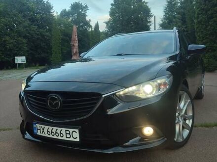 Черный Мазда 6, объемом двигателя 2.19 л и пробегом 264 тыс. км за 11900 $, фото 1 на Automoto.ua