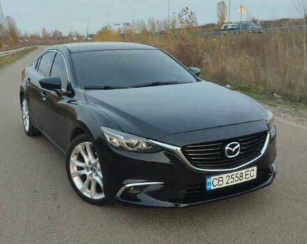 Черный Мазда 6, объемом двигателя 2.49 л и пробегом 186 тыс. км за 9900 $, фото 1 на Automoto.ua