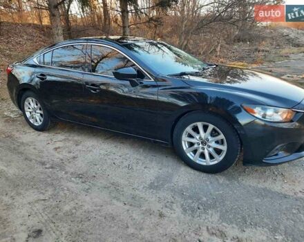 Черный Мазда 6, объемом двигателя 2.49 л и пробегом 200 тыс. км за 9700 $, фото 1 на Automoto.ua