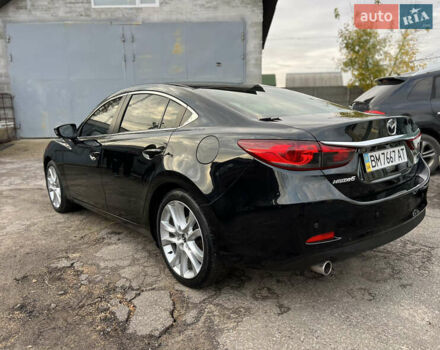 Черный Мазда 6, объемом двигателя 2.49 л и пробегом 135 тыс. км за 14500 $, фото 1 на Automoto.ua