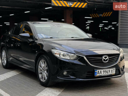 Черный Мазда 6, объемом двигателя 2 л и пробегом 148 тыс. км за 13000 $, фото 1 на Automoto.ua