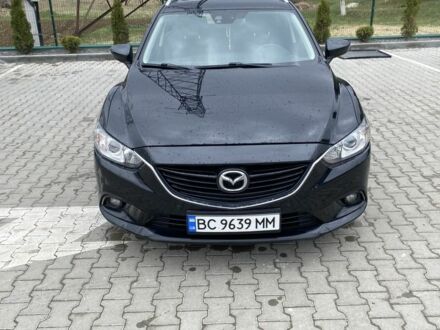 Черный Мазда 6, объемом двигателя 2.2 л и пробегом 250 тыс. км за 10500 $, фото 1 на Automoto.ua